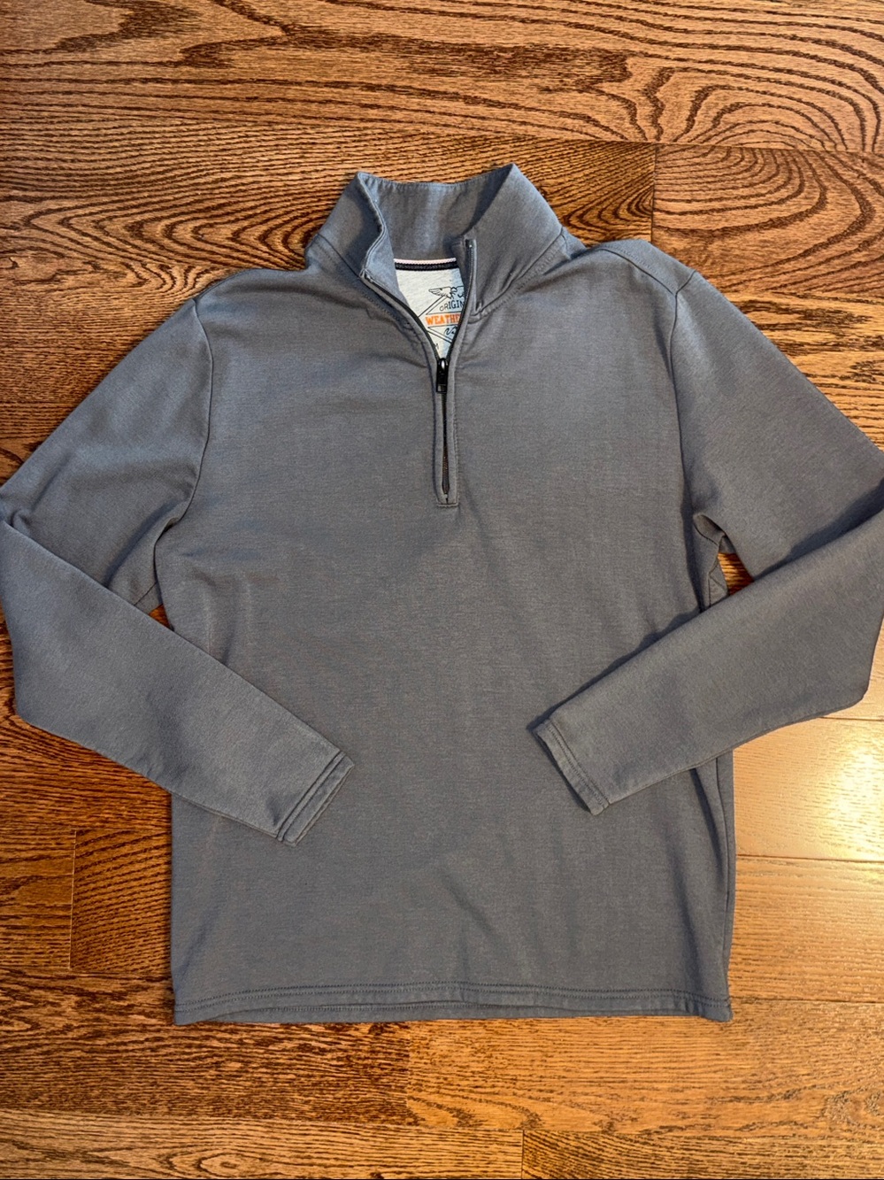 Men’s medium gray 1/4 zip pullover sweatshirt.